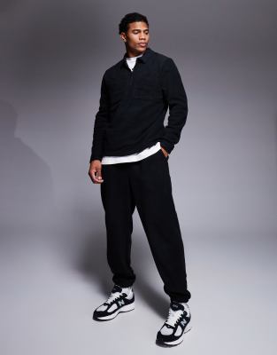 tapered fleece sweatpants in black