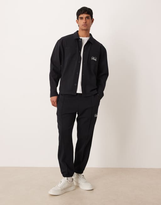 ASOS DESIGN tapered jacquard sweatpants with embroidery in navy - part of a set, 2 of 5
