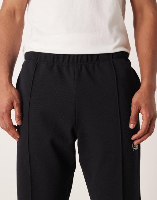 ASOS DESIGN tapered jacquard sweatpants with embroidery in navy - part of a set, 4 of 5