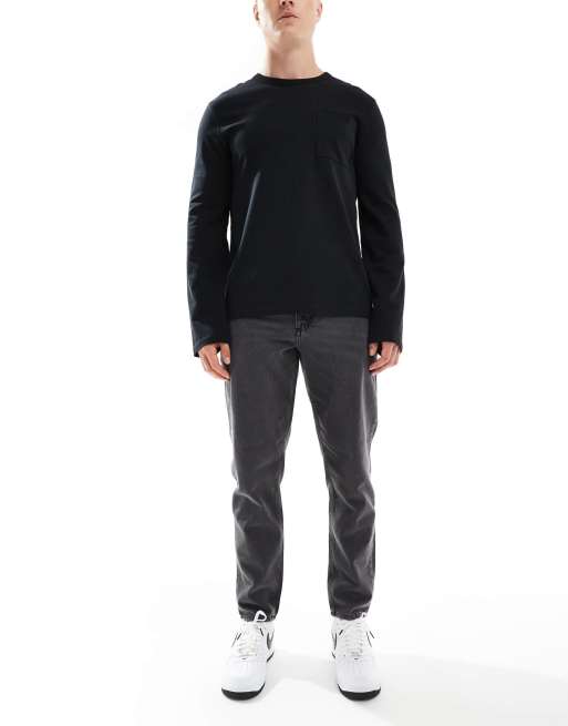 ASOS DESIGN - Tapered jeans i forvasket sort 