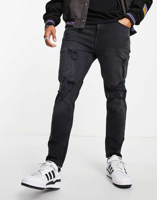 ASOS DESIGN - tapered jeans i sort vask med store flænger