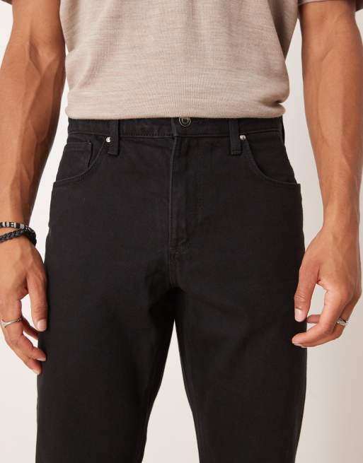 ASOS DESIGN tapered jeans in black, 4 of 5