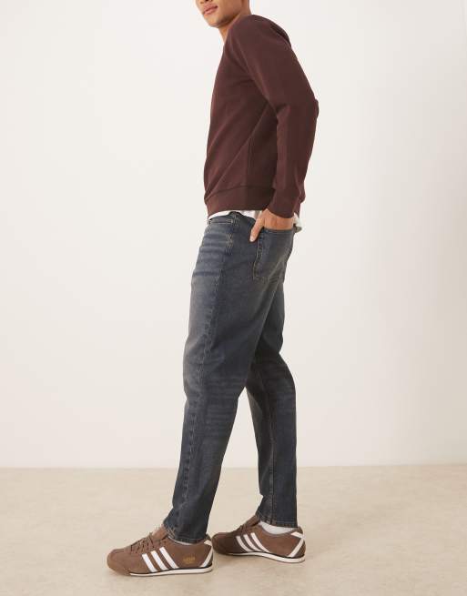ASOS DESIGN tapered jeans in dark wash blue with tint, 2 of 5