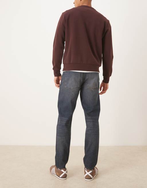 ASOS DESIGN tapered jeans in dark wash blue with tint, 3 of 5