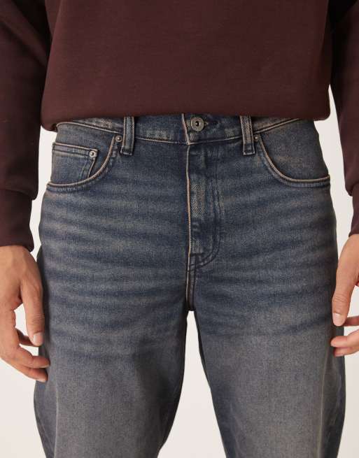 ASOS DESIGN tapered jeans in dark wash blue with tint, 4 of 5