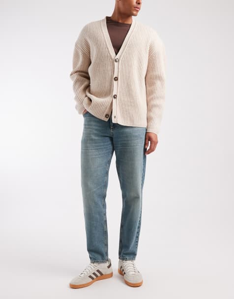 ASOS DESIGN tapered jeans in dark wash blue with tint