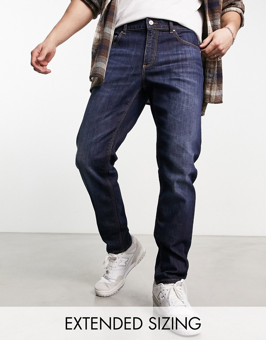 ASOS DESIGN tapered jeans in dark wash blue