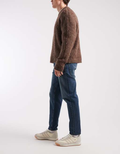 ASOS DESIGN tapered jeans in dark wash blue, 2 of 5