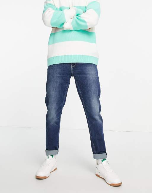ASOS DESIGN tapered jeans in dark wash blue 