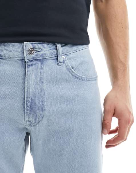 ASOS DESIGN tapered jeans in light stone wash blue - view 1