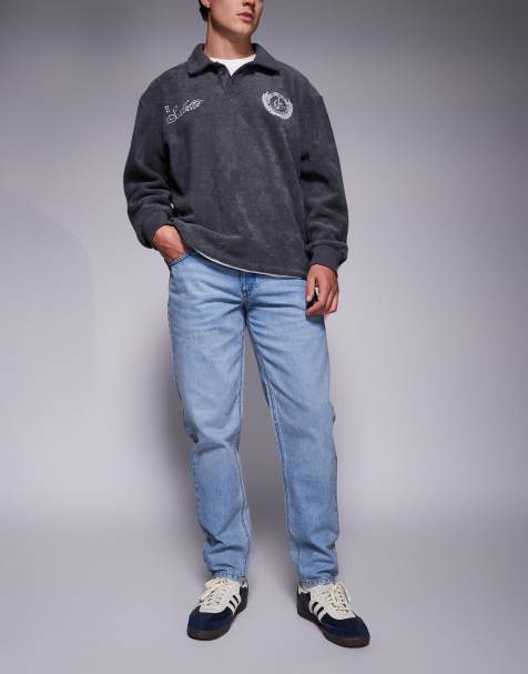 ASOS DESIGN tapered jeans in light wash blue - view 1