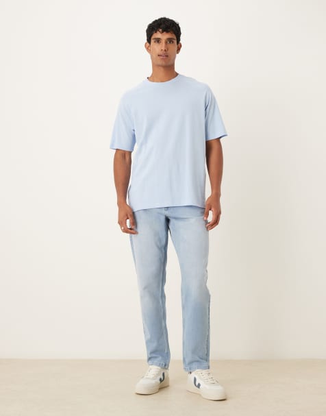 ASOS DESIGN tapered jeans in light wash comfort stretch denim - view 1