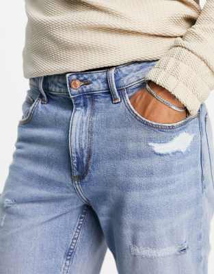 destroyed tapered jeans