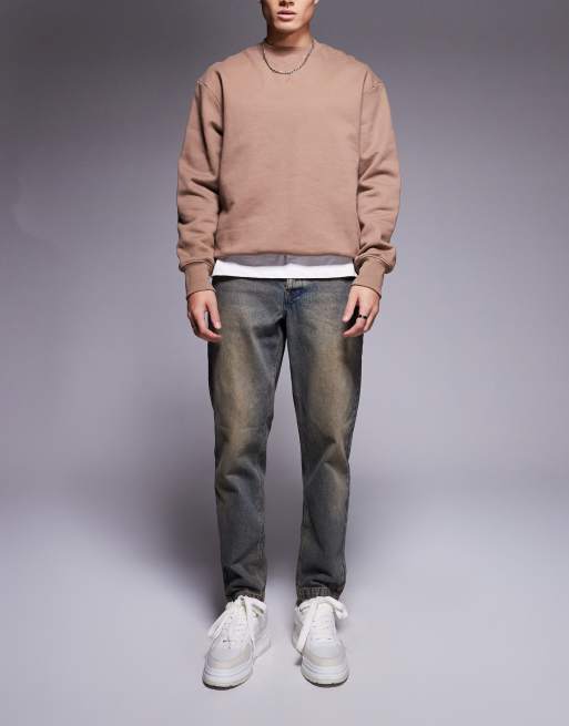 ASOS DESIGN tapered jeans in light wash with tint