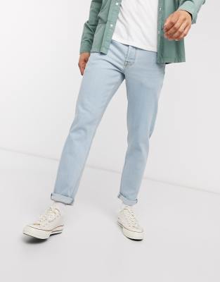 ASOS DESIGN tapered jeans in light wash 