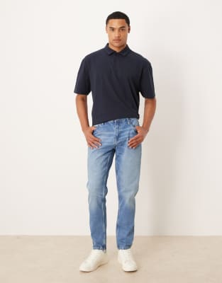tapered jeans in light wash-Blue