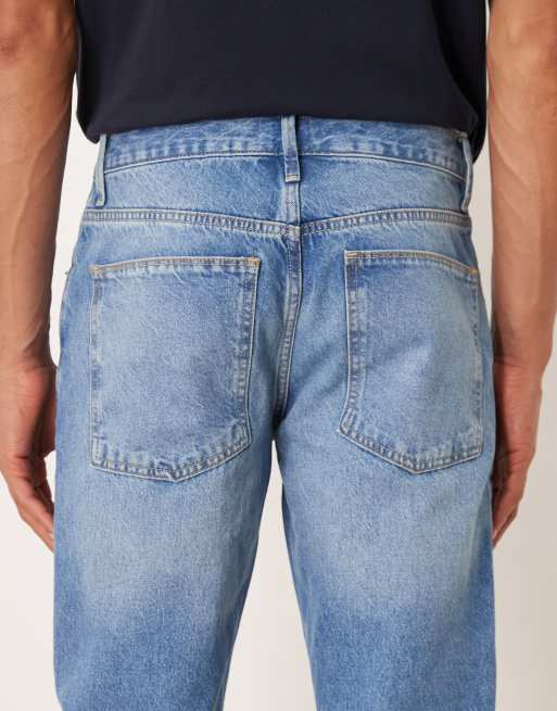 ASOS DESIGN tapered jeans in light wash , 5 of 5