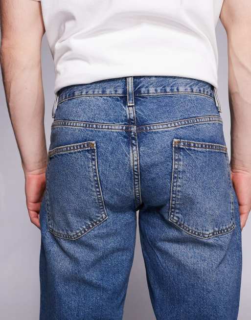 ASOS DESIGN tapered jeans in mid wash blue tint, 4 of 5