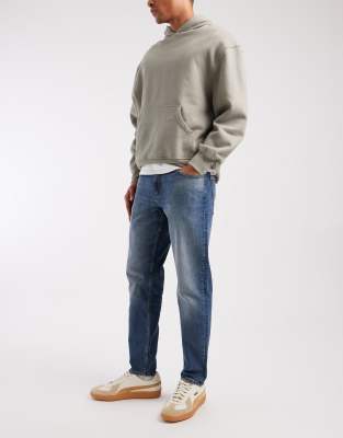Asos Design Tapered Jeans In Blue