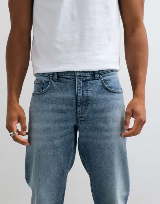 ASOS DESIGN tapered jeans in mid wash blue with tint, 4 of 5