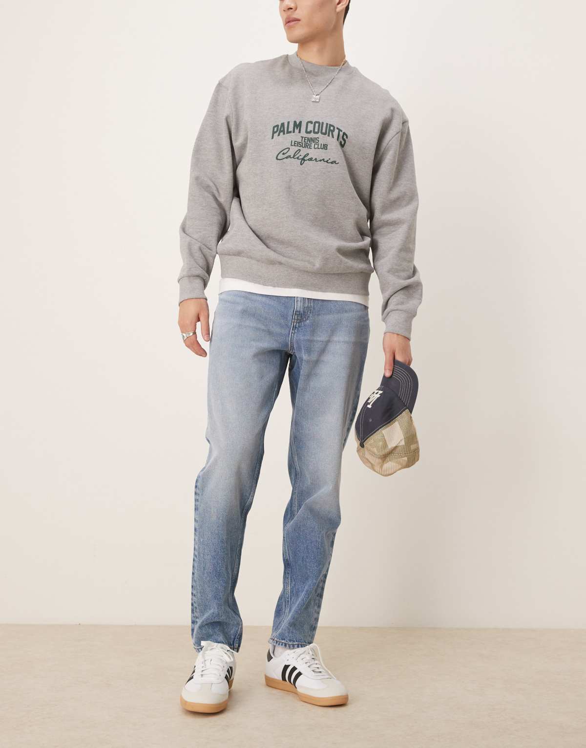 ASOS DESIGN tapered jeans in mid wash blue