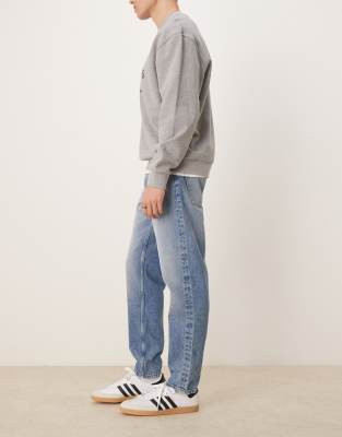 Asos Design Tapered Jeans In Blue