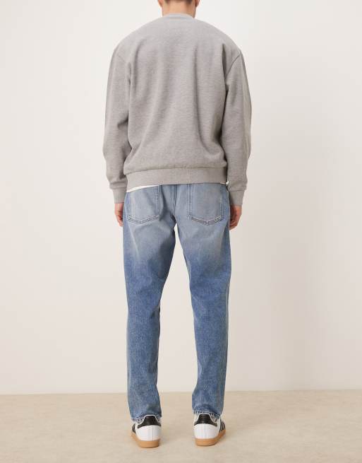 ASOS DESIGN tapered jeans in mid wash blue, 3 of 5
