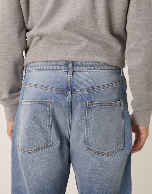 ASOS DESIGN tapered jeans in mid wash blue, 5 of 5