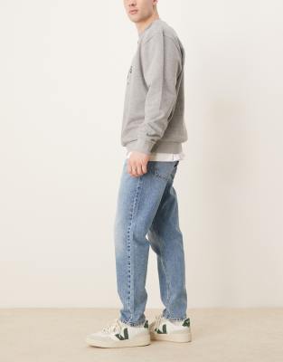 Asos Design Tapered Jeans In Blue