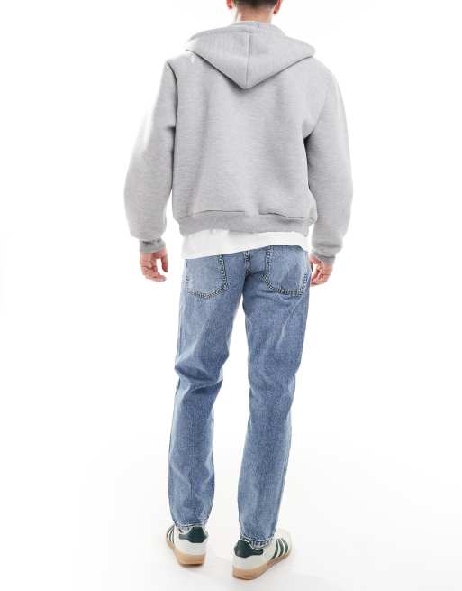 ASOS DESIGN tapered jeans in mid wash blue, 2 of 5