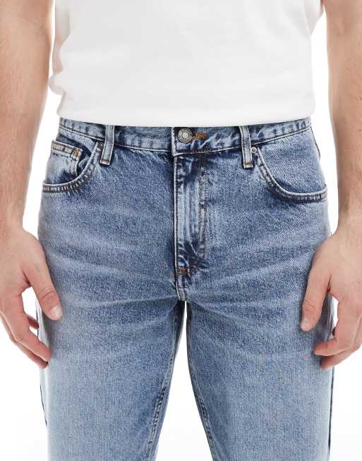 ASOS DESIGN tapered jeans in mid wash blue, 5 of 5