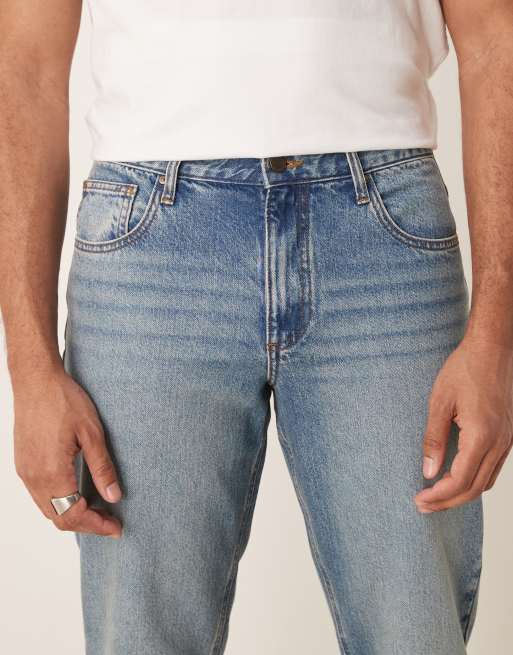 ASOS DESIGN tapered jeans in mid wash blue