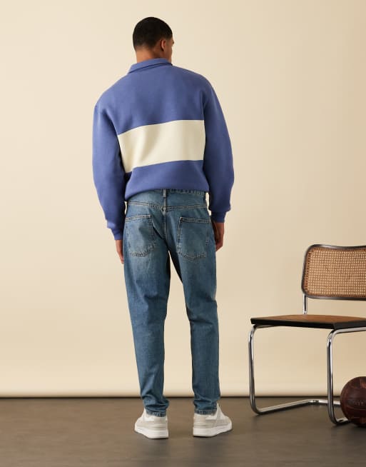 ASOS DESIGN tapered jeans in mid wash blue