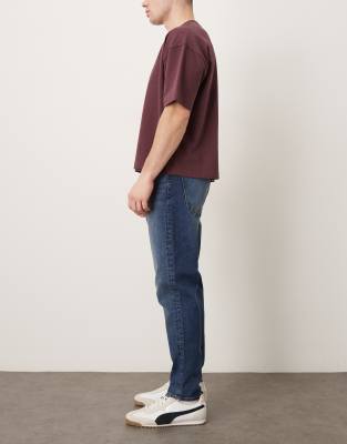Asos Design Tapered Jeans In Blue