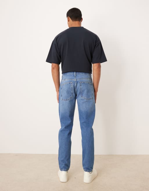 ASOS DESIGN tapered jeans in mid wash , 3 of 5