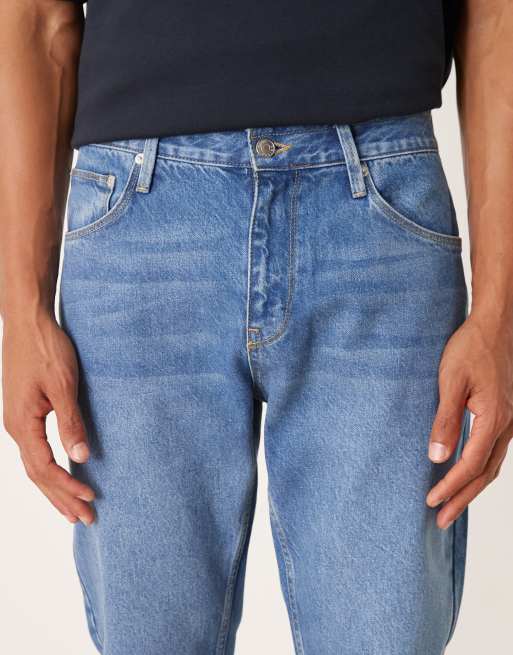 ASOS DESIGN tapered jeans in mid wash , 4 of 5