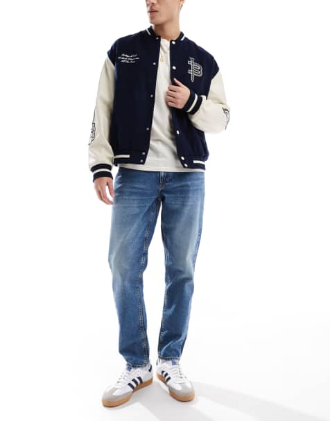 ASOS DESIGN tapered jeans in tinted dark wash blue - view 1