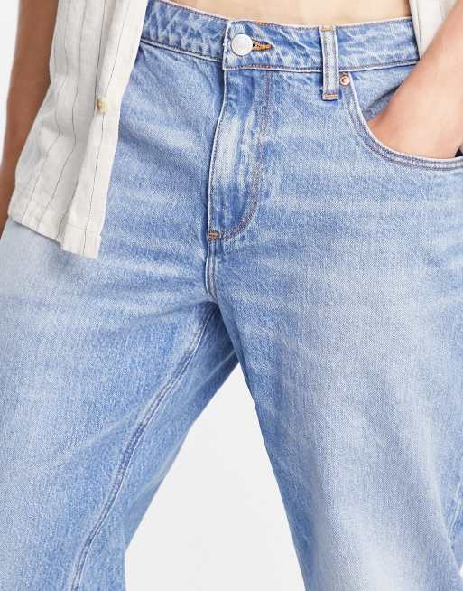 ASOS DESIGN tapered jeans in light wash blue