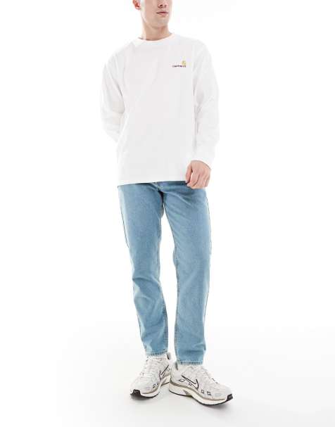 ASOS DESIGN tapered jeans in tinted light wash blue 