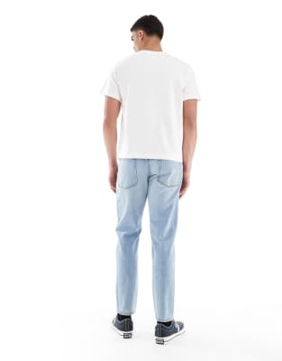 Asos Design Tapered Fit Jeans In Blue
