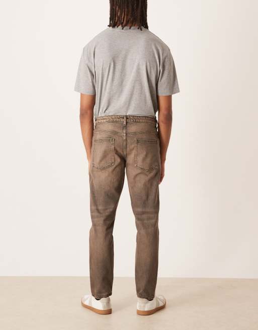 ASOS DESIGN tapered jeans in washed black with brown tint, 2 of 5