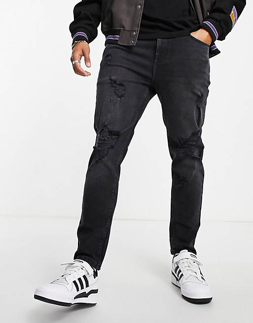 Tapered rip and repair jeans in dark wash ASOS Herren Kleidung Hosen & Jeans Jeans Tapered Jeans 