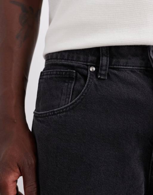 ASOS DESIGN tapered jeans in washed black 