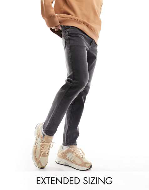 ASOS DESIGN tapered jeans in washed black - view 1