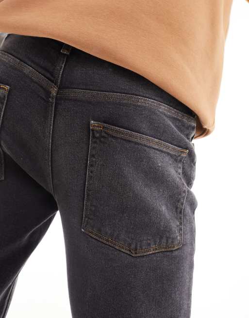 ASOS DESIGN tapered jeans in washed black, 5 of 5