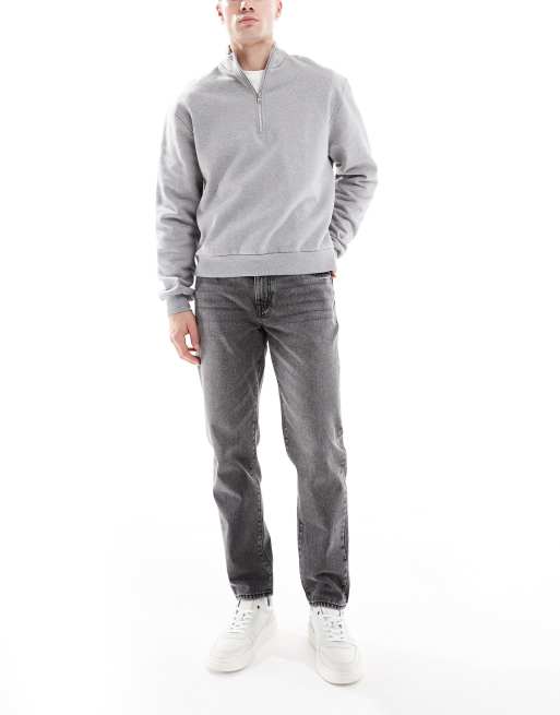 ASOS DESIGN tapered jeans in washed black