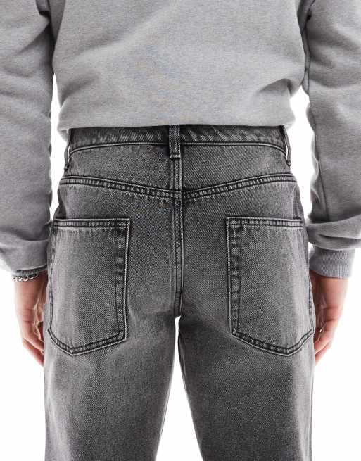 ASOS DESIGN tapered jeans in washed black