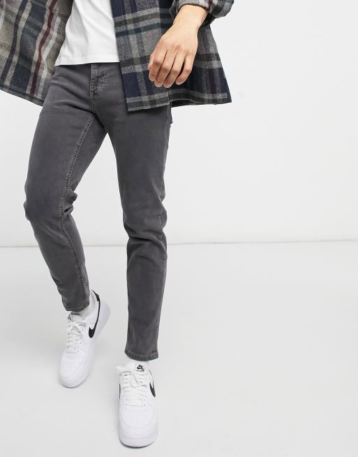 ASOS DESIGN tapered jeans in washed black ASOS