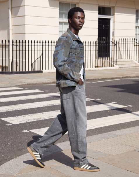 ASOS DESIGN tapered jeans in washed grey with rips - view 1