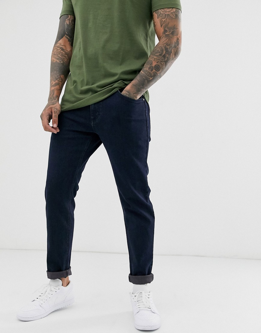ASOS DESIGN - tapered jeans med stræk i indigo-Blå